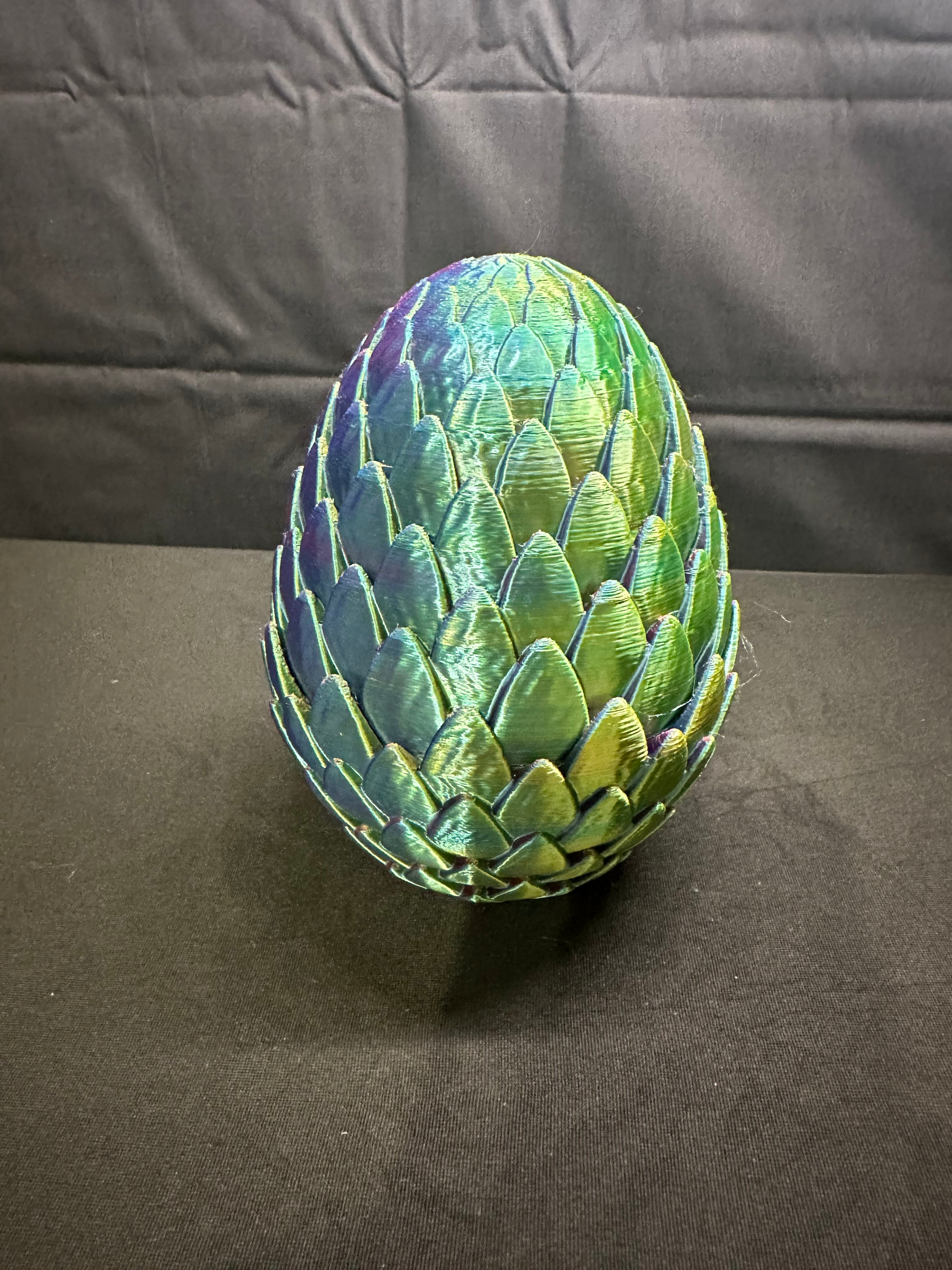 Dragon egg with baby dragon