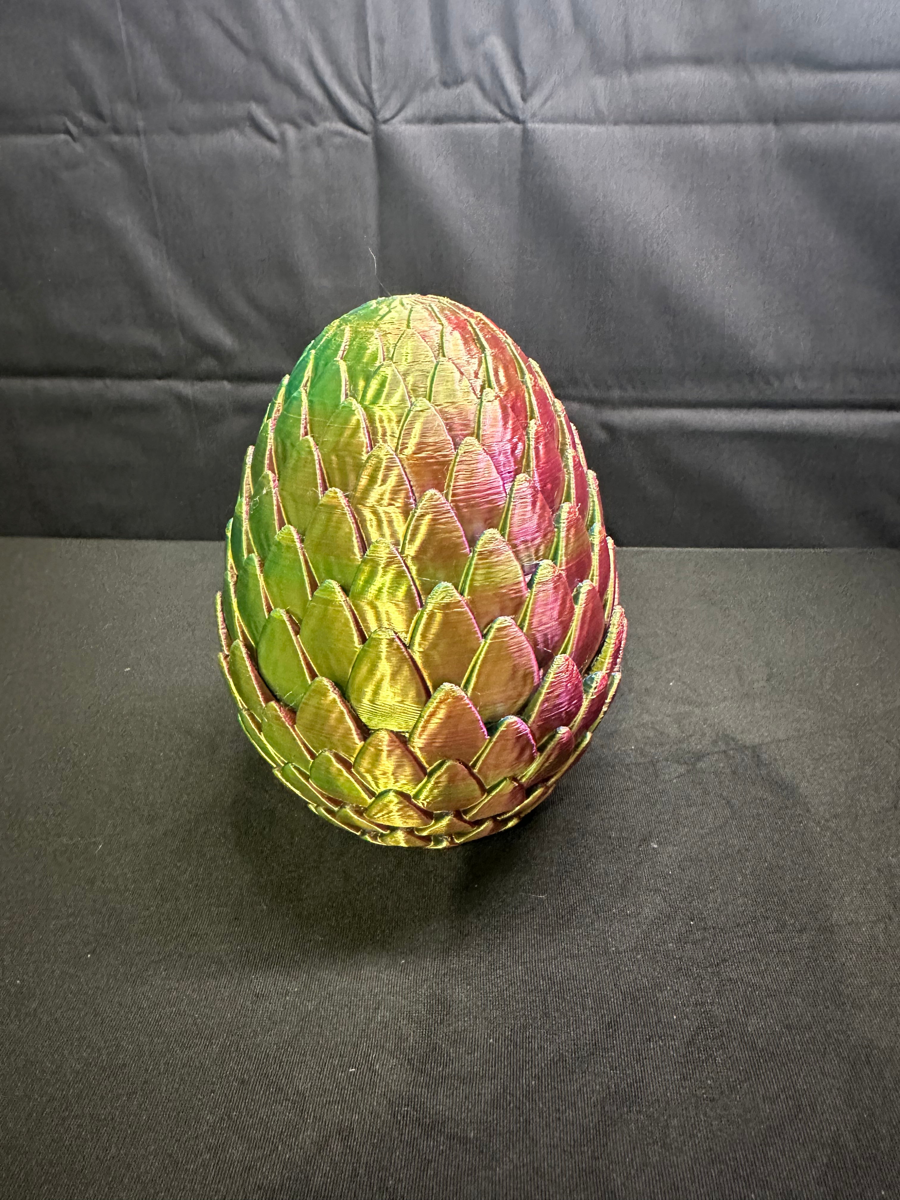 Dragon egg with baby dragon