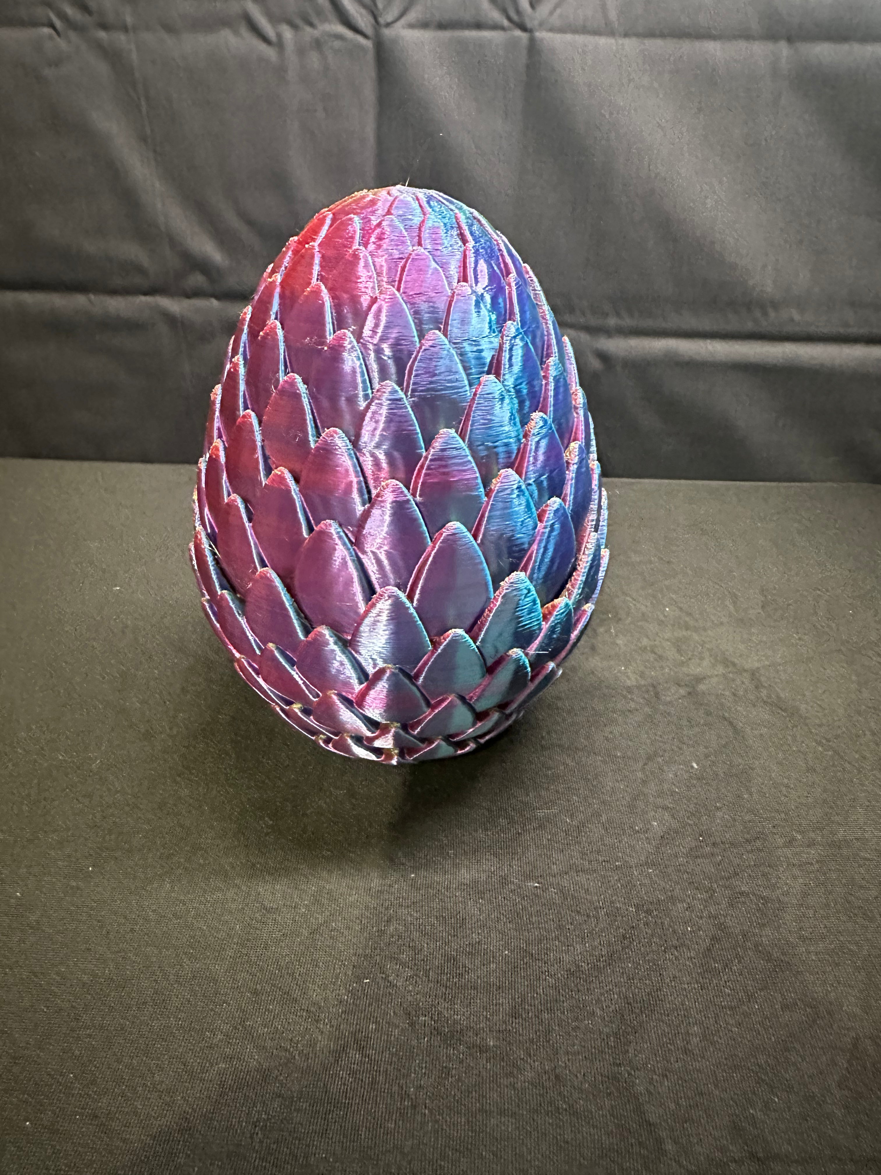 Dragon egg with baby dragon