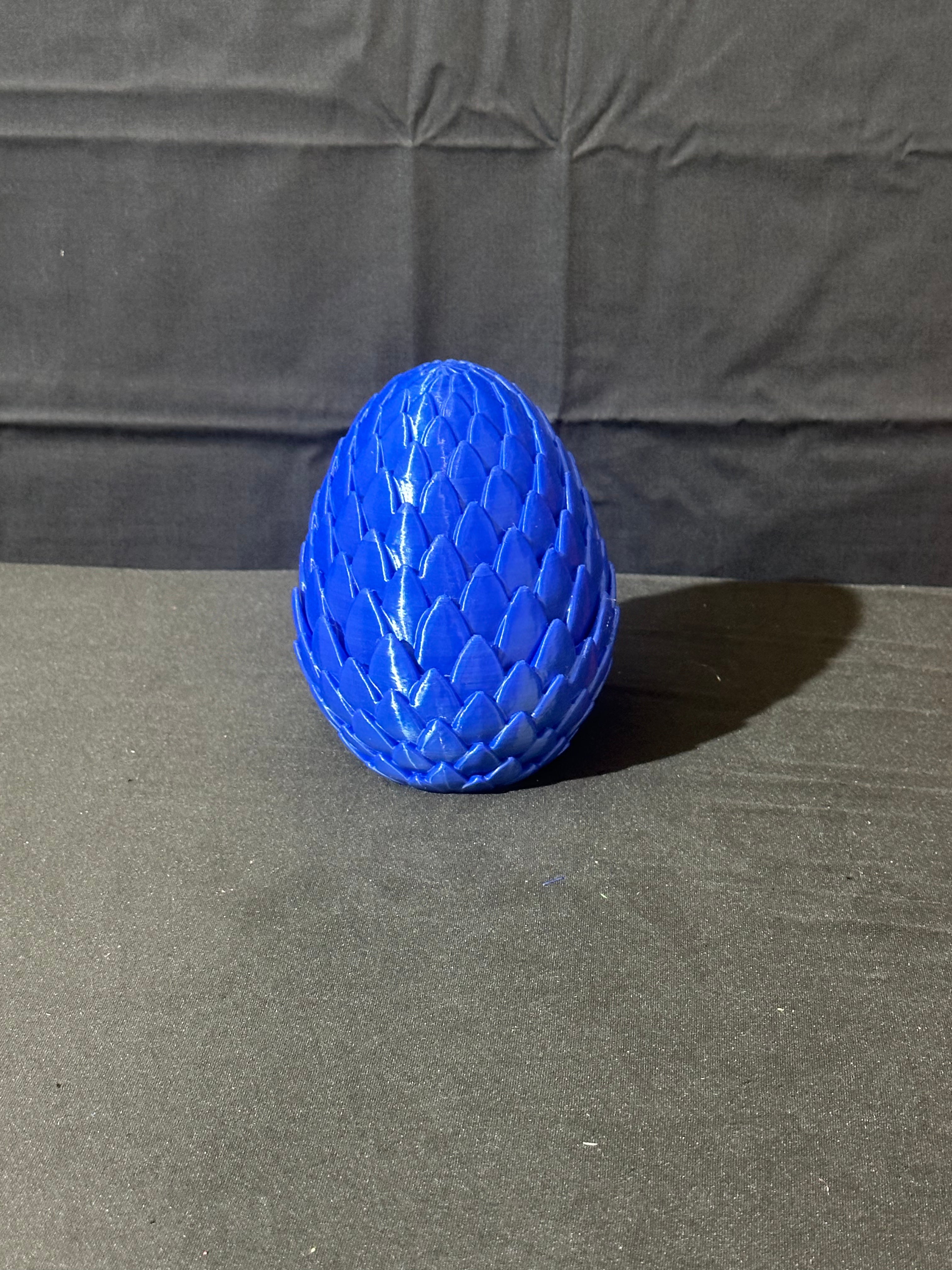 Dragon egg with baby dragon
