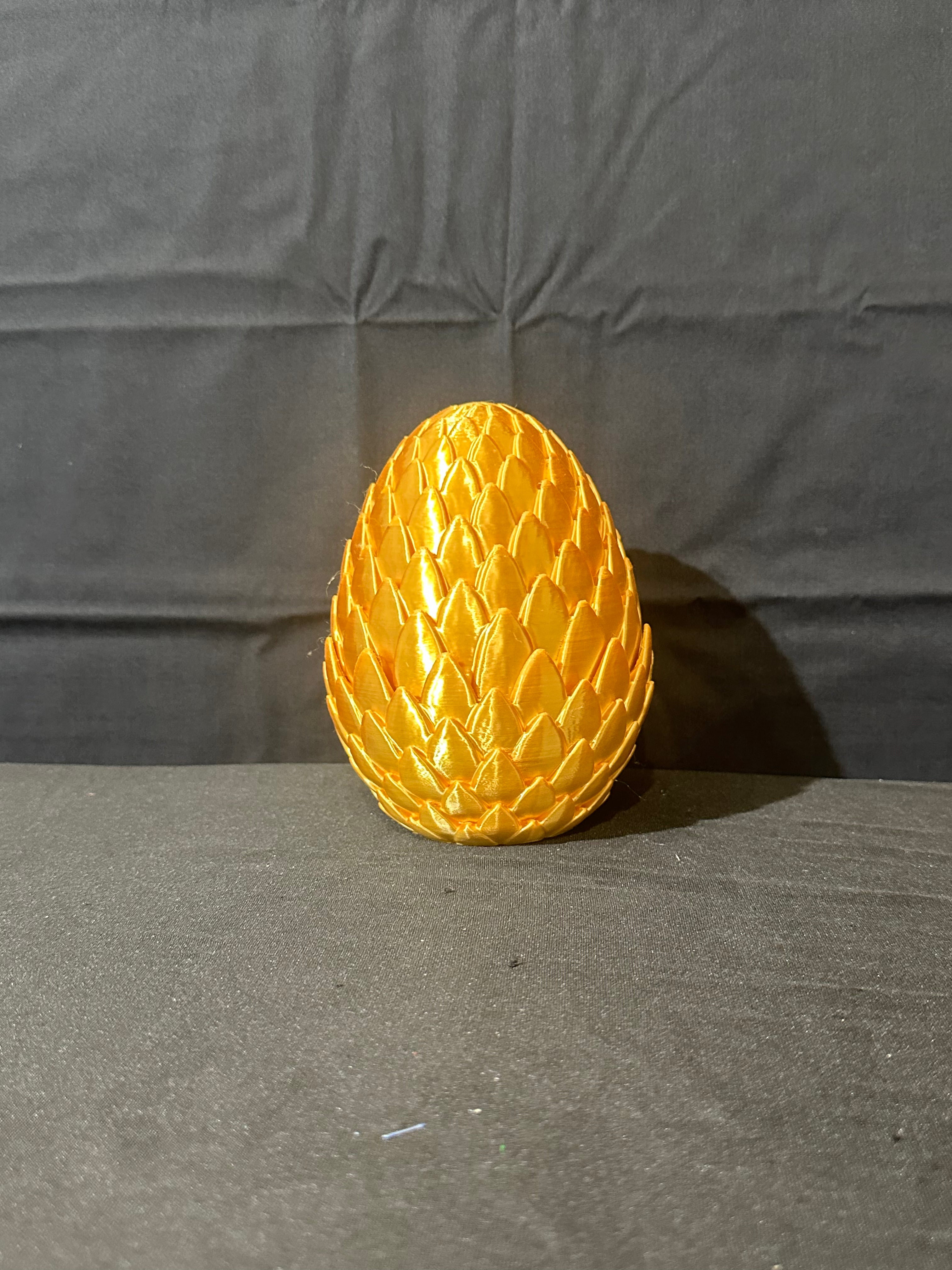 Dragon egg with baby dragon
